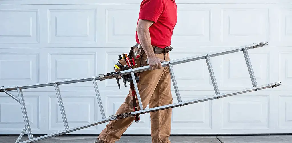 Garage door repair technician arriving with tools and ladder in Fort Collins, CO